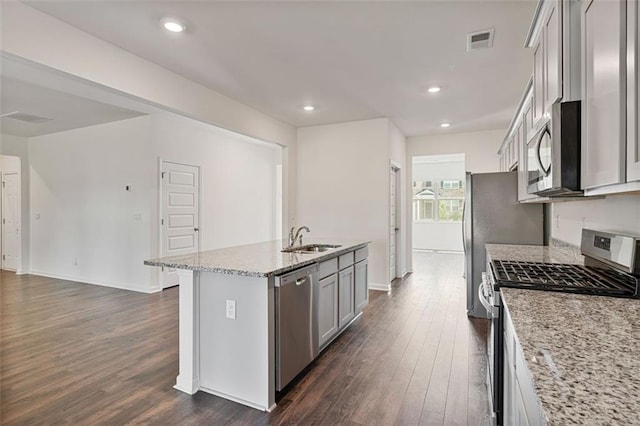 4117 Flat Rock Pt, Stonecrest, GA 30038 - kitchen featuring appliances with stainless steel finishes, a sink, a kitchen island with sink, dark wood finished floors, and recessed lighting