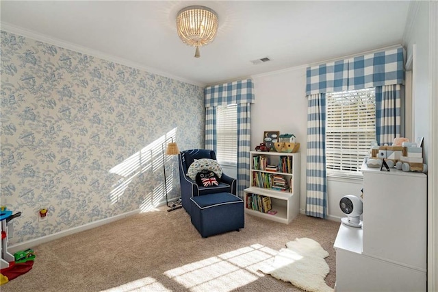 living area featuring crown molding and carpet