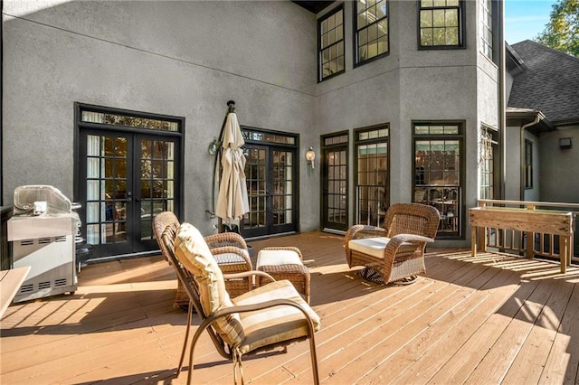 wooden deck with french doors