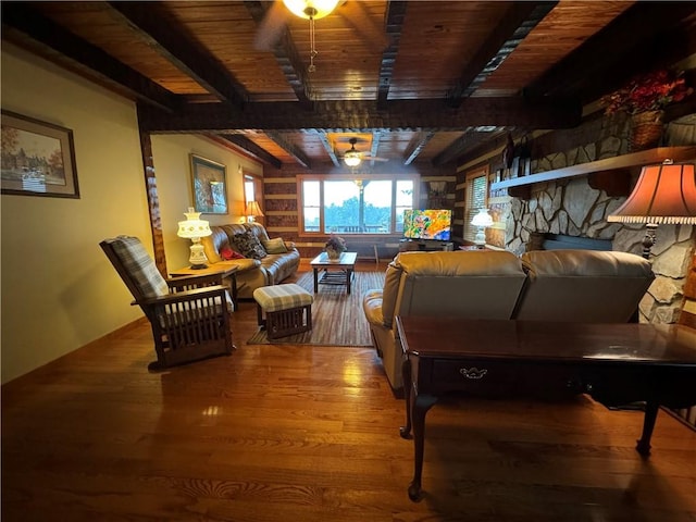 interior space with wood ceiling, beam ceiling, ceiling fan, and hardwood / wood-style floors