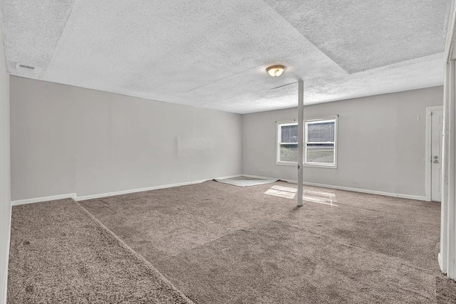 5338 Timor Trl, Lithonia, GA 30038 - carpeted empty room featuring a textured ceiling and baseboards