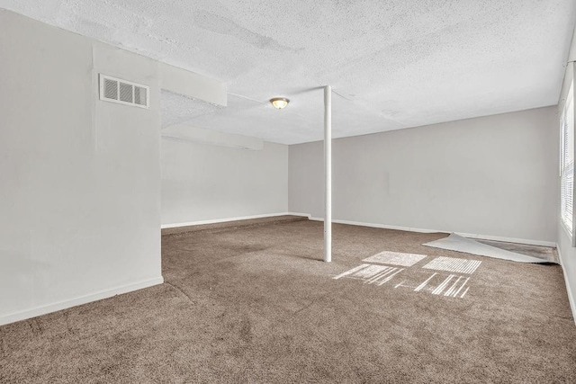 5338 Timor Trl, Lithonia, GA 30038 - finished below grade area with carpet floors, a textured ceiling, and baseboards