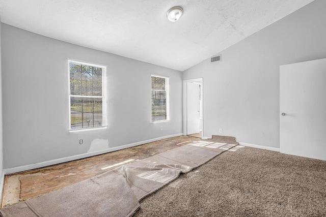 5338 Timor Trl, Lithonia, GA 30038 - spare room featuring lofted ceiling and baseboards
