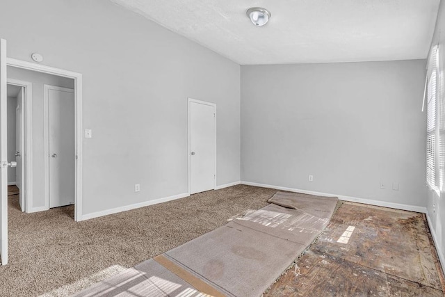 5338 Timor Trl, Lithonia, GA 30038 - empty room featuring baseboards, a smoke detector, and carpet flooring