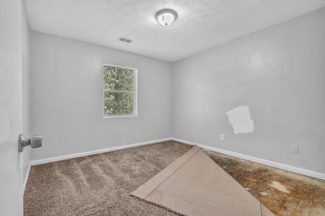 5338 Timor Trl, Lithonia, GA 30038 - carpeted empty room featuring a textured ceiling and baseboards