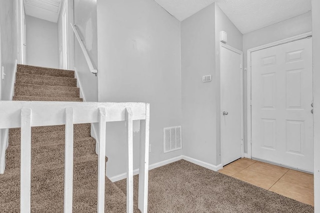 5338 Timor Trl, Lithonia, GA 30038 - stairway with baseboards and tile patterned flooring