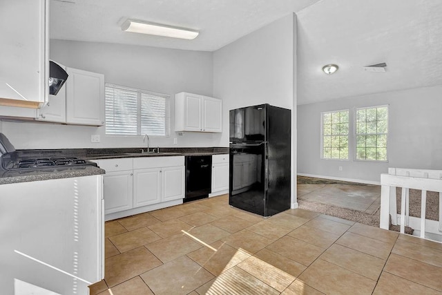 5338 Timor Trl, Lithonia, GA 30038 - kitchen featuring black appliances, a sink, dark countertops, white cabinetry, and light tile patterned floors