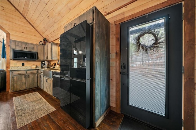 kitchen featuring lofted ceiling, wooden ceiling, wood walls, light countertops, and dark wood-style floors