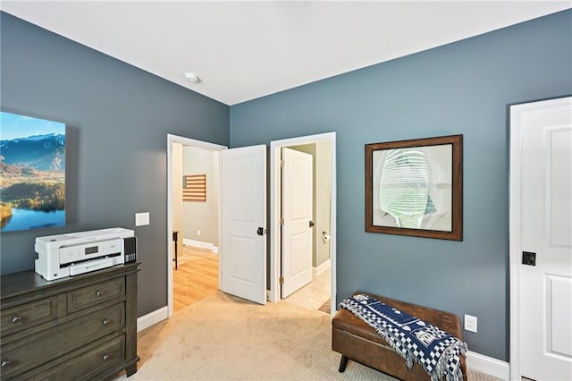 215 Dragonfly Way, Winder, GA 30680 - sitting room with baseboards and light carpet