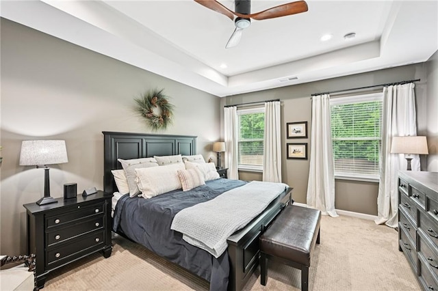 215 Dragonfly Way, Winder, GA 30680 - bedroom featuring a raised ceiling, baseboards, light colored carpet, ceiling fan, and recessed lighting