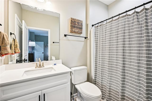 215 Dragonfly Way, Winder, GA 30680 - full bath featuring vanity, toilet, and a shower with curtain
