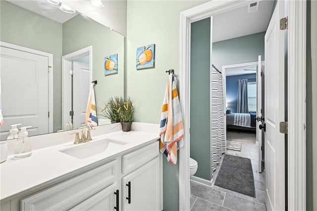 215 Dragonfly Way, Winder, GA 30680 - bathroom with toilet, vanity, and ensuite bath