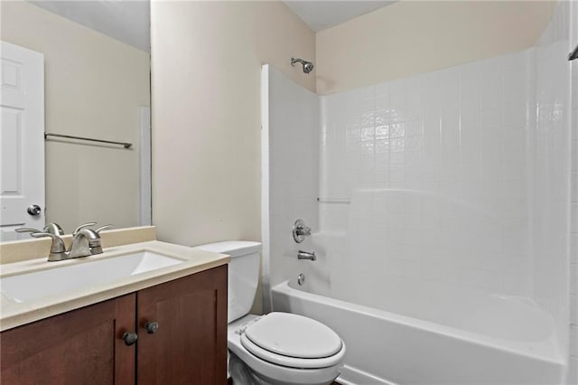 full bathroom featuring shower / tub combination, vanity, and toilet