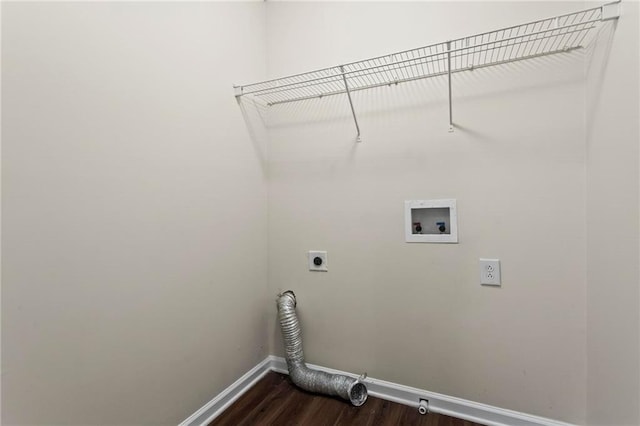 washroom with hookup for a washing machine, electric dryer hookup, and dark hardwood / wood-style floors