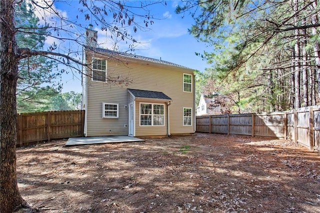 rear view of house with a patio