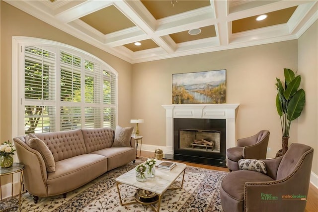 living area with crown molding, a fireplace, coffered ceiling, beamed ceiling, and baseboards