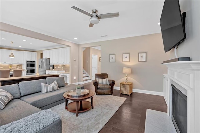 12 Pine St, Roswell, GA 30075 - living room featuring baseboards, ceiling fan, dark wood-type flooring, recessed lighting, and a fireplace with flush hearth