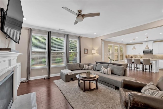 12 Pine St, Roswell, GA 30075 - living area featuring dark wood finished floors, ceiling fan, baseboards, a high end fireplace, and recessed lighting