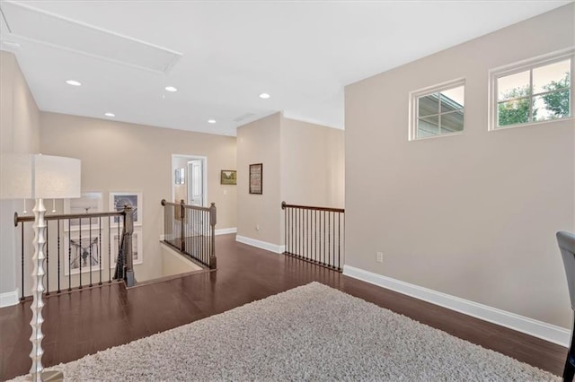 12 Pine St, Roswell, GA 30075 - hallway with an upstairs landing, attic access, wood finished floors, baseboards, and recessed lighting