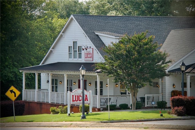 12 Pine St, Roswell, GA 30075 - view of front of house featuring a porch and roof with shingles