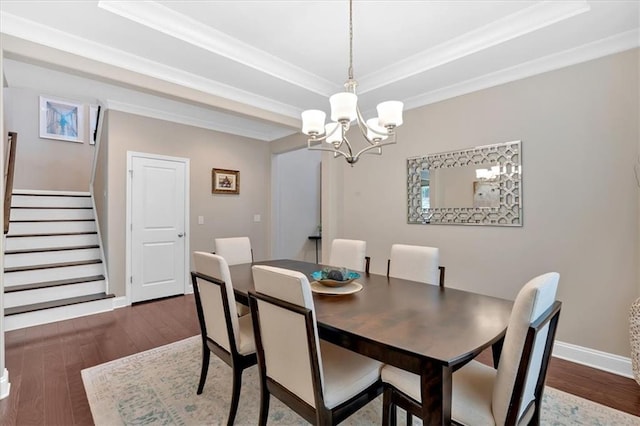 12 Pine St, Roswell, GA 30075 - dining space featuring a chandelier, stairs, dark wood-style floors, ornamental molding, and baseboards