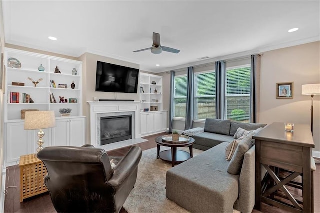 12 Pine St, Roswell, GA 30075 - living area featuring ceiling fan, wood finished floors, a premium fireplace, recessed lighting, and crown molding