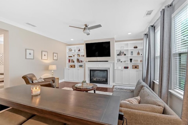 12 Pine St, Roswell, GA 30075 - living room featuring a glass covered fireplace, a ceiling fan, wood finished floors, recessed lighting, and baseboards