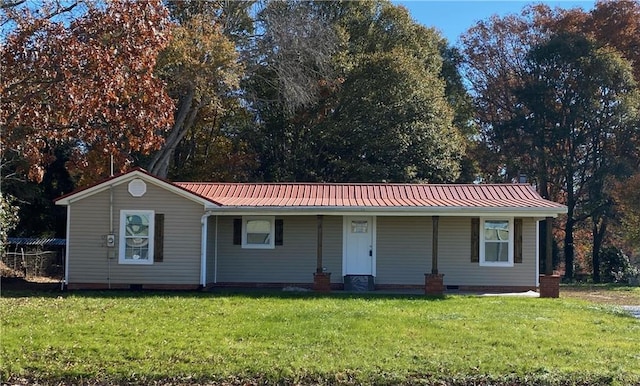 single story home with a front lawn