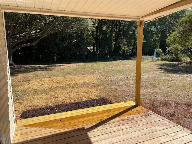 view of yard with a wooden deck