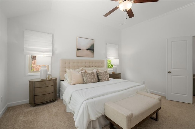 bedroom with baseboards, ceiling fan, lofted ceiling, and light colored carpet