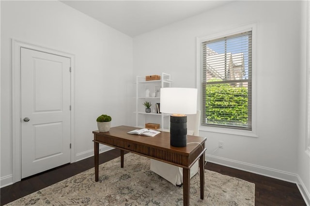 office space featuring baseboards and dark wood-style floors