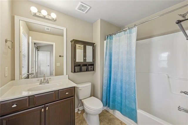 full bathroom featuring toilet, baseboards, visible vents, tile patterned flooring, and vanity