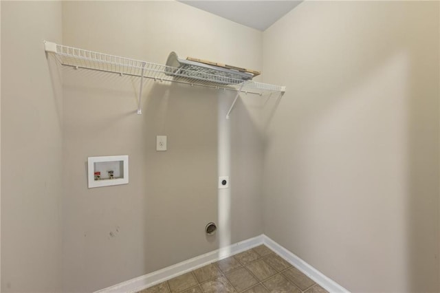 clothes washing area with baseboards, laundry area, washer hookup, and electric dryer hookup