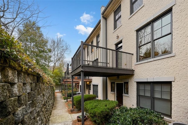 view of property exterior featuring a balcony