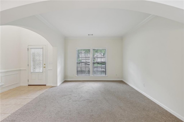 230 Collins View Ct, Lawrenceville, GA 30043 - unfurnished room with plenty of natural light, light colored carpet, ornamental molding, and arched walkways