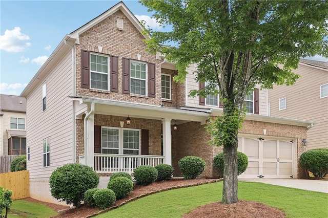 230 Collins View Ct, Lawrenceville, GA 30043 - traditional-style home with covered porch, concrete driveway, a garage, and brick siding