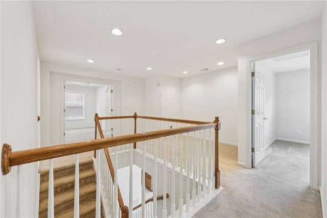 230 Collins View Ct, Lawrenceville, GA 30043 - hallway featuring attic access, an upstairs landing, light carpet, recessed lighting, and baseboards