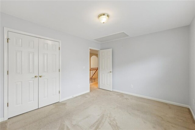 230 Collins View Ct, Lawrenceville, GA 30043 - unfurnished bedroom featuring attic access, carpet floors, and baseboards