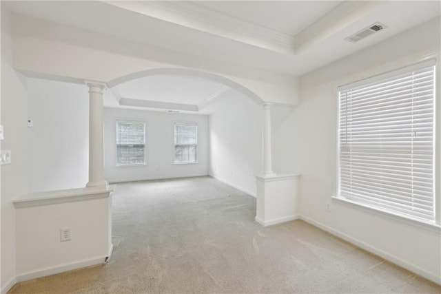 230 Collins View Ct, Lawrenceville, GA 30043 - carpeted spare room with a tray ceiling, decorative columns, arched walkways, crown molding, and baseboards