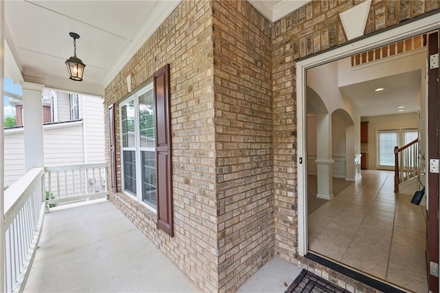 230 Collins View Ct, Lawrenceville, GA 30043 - property entrance with covered porch and brick siding