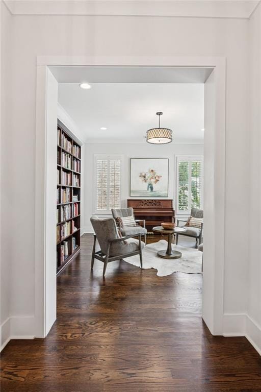 5971 Brundage Ln, Norcross, GA 30071 - living area with wood finished floors, baseboards, ornamental molding, and recessed lighting
