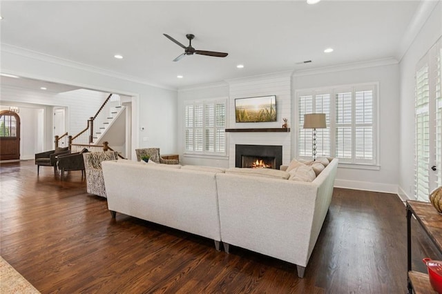 5971 Brundage Ln, Norcross, GA 30071 - living room featuring a fireplace, a ceiling fan, plenty of natural light, ornamental molding, and recessed lighting
