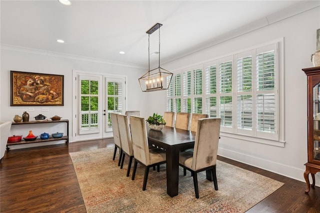 5971 Brundage Ln, Norcross, GA 30071 - dining room featuring crown molding, a chandelier, dark wood-style floors, baseboards, and recessed lighting
