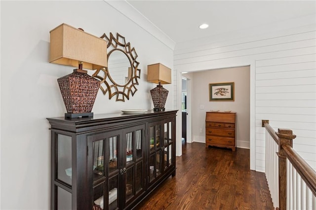 5971 Brundage Ln, Norcross, GA 30071 - hallway featuring dark wood-type flooring, an upstairs landing, recessed lighting, ornamental molding, and baseboards