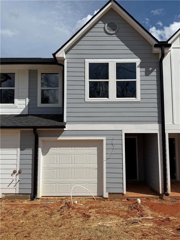 exterior space with an attached garage