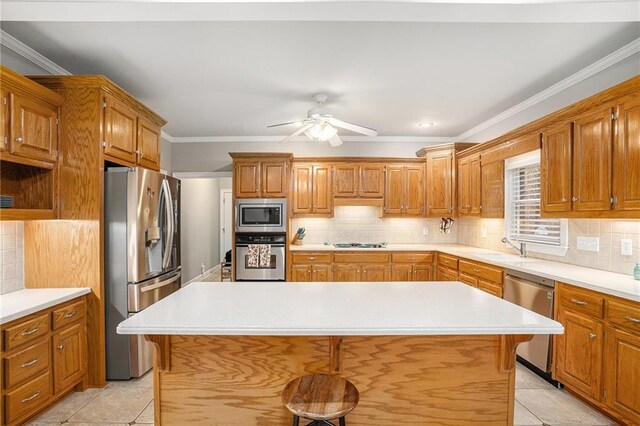 kitchen with backsplash, white gas stovetop, dishwasher, and sink