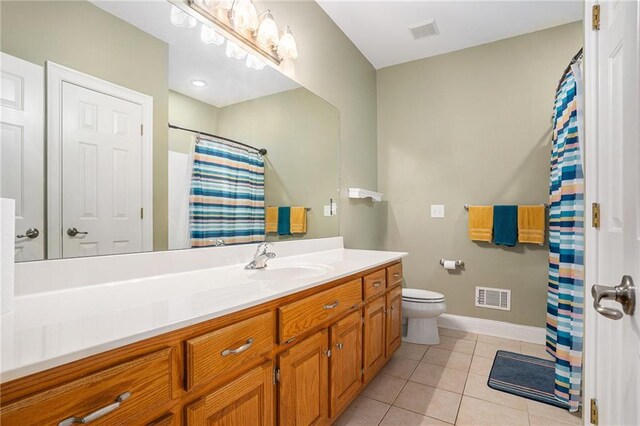 carpeted bedroom with a raised ceiling, ceiling fan, and ornamental molding