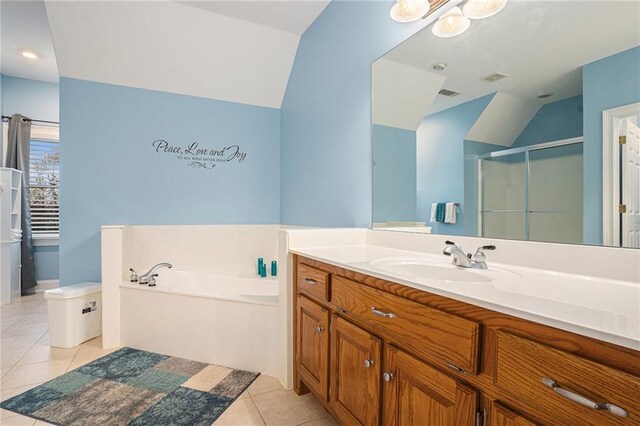 bathroom featuring tile patterned floors, vanity, toilet, and walk in shower