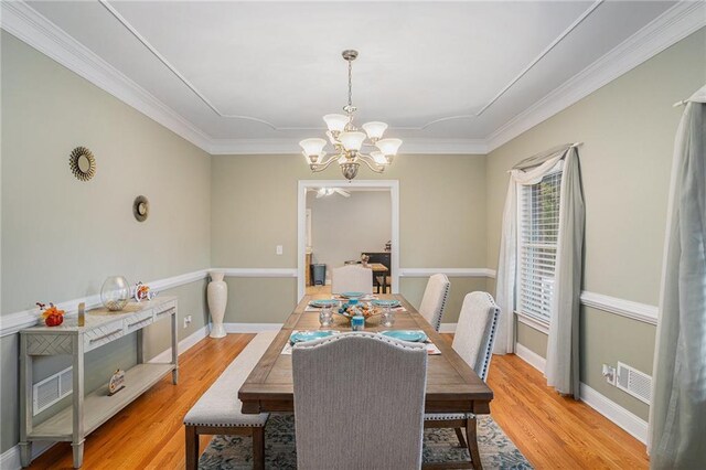 living room featuring ceiling fan, high vaulted ceiling, light hardwood / wood-style floors, and ornamental molding