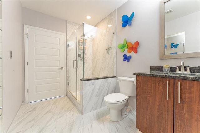 bathroom featuring vanity, toilet, marble finish floor, a stall shower, and visible vents